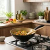 Pan on a gas stove sautés colorful mixed vegetables with a wooden spatula inside.