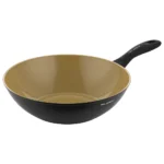 Nonstick frying pan with a black exterior and a gold-toned interior, handle extending to the right.
